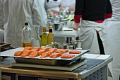 Prepared salmon fillets in a commercial kitchen