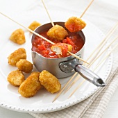 Chicken nuggets with tomato sauce