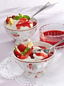 Yogurt and lemon mousse with strawberry sauce