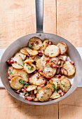 Fried potatoes with diced bacon