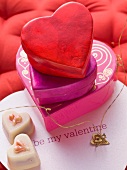 Heart-shaped gift boxes and petit fours