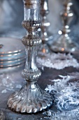 Silver candlesticks on festive table