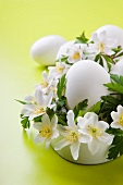 Easter arrangement: wood anemones and eggs with white shells