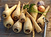 Parsnips on a wooden surface