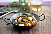 Pichelstein stew with spring vegetables and beef