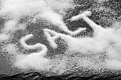 The word SALT written in salt