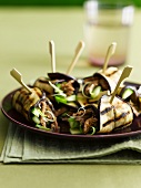 Grilled aubergine rolls with lamb and cucumber