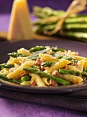 Penna pasta with pancetta, asparagus and grated Parmesan