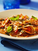 Quadrati pasta with pepper sauce and fresh basil
