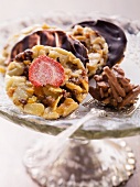 Chocolate almond brittle and florentines with dried fruits