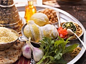 Salted lemons, garlic, unleavened bread and couscous