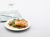 Salmon fillet with Asian vegetables and limes