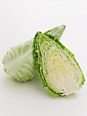 A pointed cabbage, cut in half