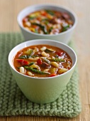 Savoy cabbage soup with beans and peppers
