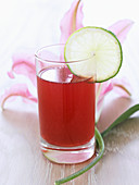 Cranberry juice with lime slices