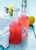 Sweet rhubarb juice in flip-top bottles