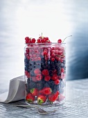 Fresh berries in a glass container