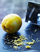 A lemon with the zest grated