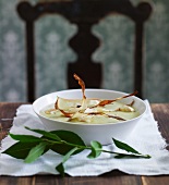 Cream of potato soup with vegetable chips