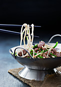 Stir-fired beef with noodles