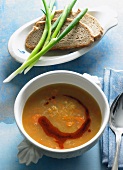 Lentil soup with pepper butter and bread