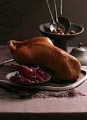 Goose with a chestnut and apple filling on a bed of ginger and pear red cabbage