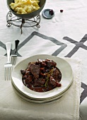 Lamb goulash with port wine and cranberry sauce