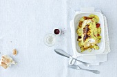 Turbot gratin with tarragon sauce and potatoes