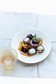 Aubergine rolls with preserved figs and strips of pepper