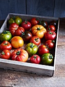 A crate of heirloom tomatoes