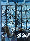 Rustic seating area in loggia with furs on chair