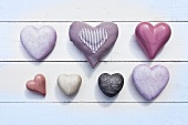 Purple hearts made of different materials