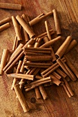 Cinnamon sticks on a wooden surface