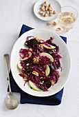 Red cabbage salad with beetroot, apples and nuts