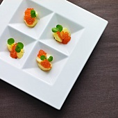 Chum salmon caviar on potato slices