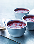 Three servings of strawberry soup