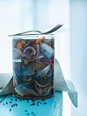 Pickled herrings in a jar