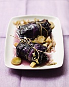 Red cabbage roulade filled with minced meat and leek