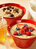 Wheat porridge with fresh berries, oats with nuts and honey