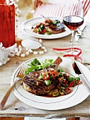 Grilled rib-eye steak with pepper and almond salsa