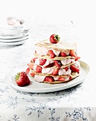 A pancake cake with strawberries and coconut quark