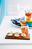 Prawn and dill tartlets and a fizzy strawberry drink