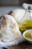 Fresh white bread, olive oil and hummus