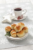 Bread rolls filled with sauerkraut and mushrooms and a cup of borscht