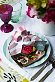 A place setting with floral cards