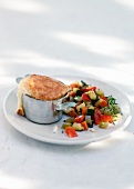 Goat's cheese souffle with vegetable salad