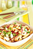 Penne with prawns and beetroot strips