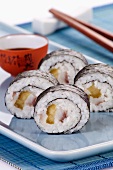 Maki sushi with herring and gherkins