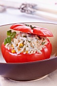 A tomato stuffed with couscous and blue cheese