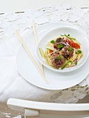 Egg noodles with meatballs and ginger (China)